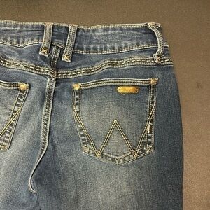 509.   Wrangler size 7/8 x 30 long